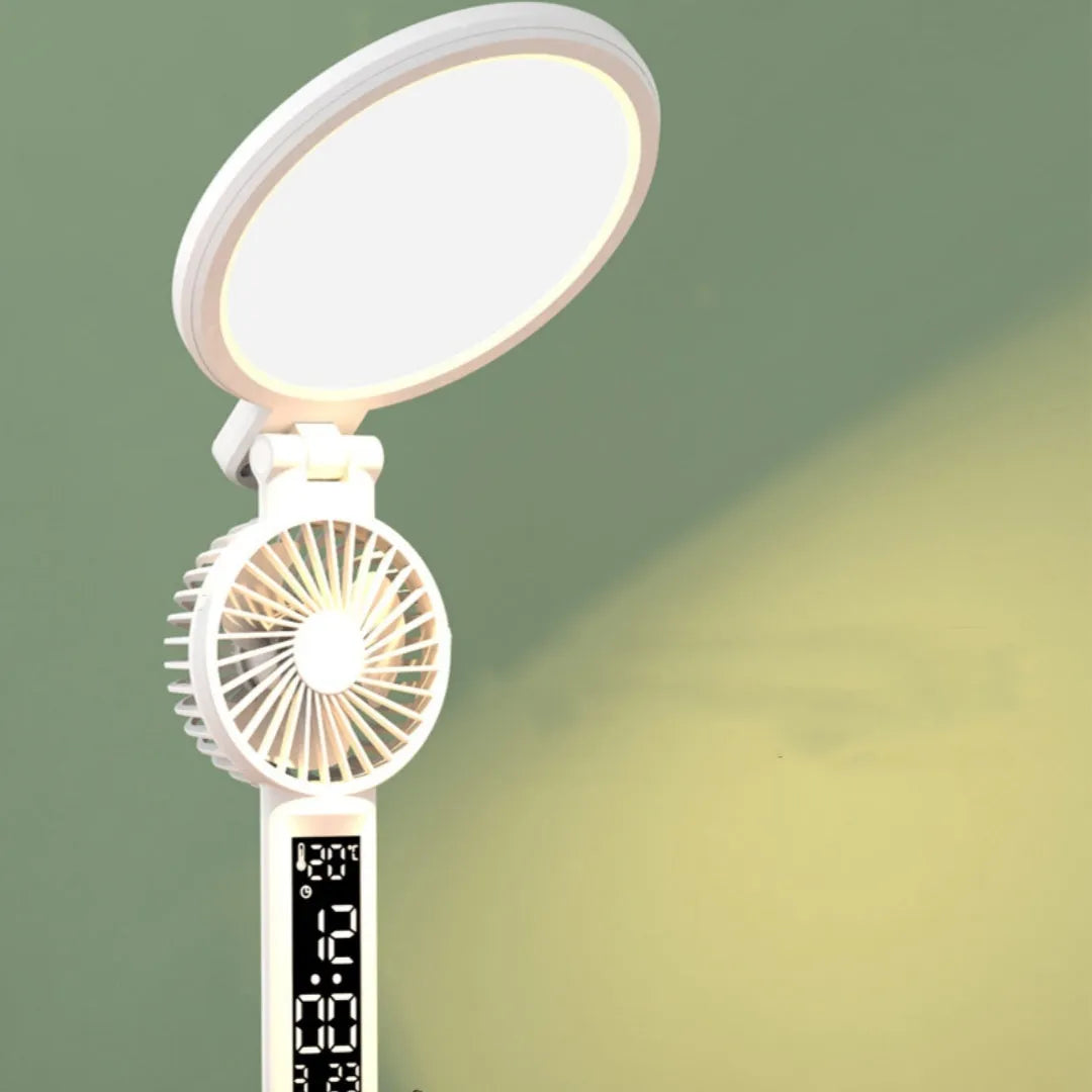LED clock table lamp with foldable design, fan, and USB rechargeable battery on a desk