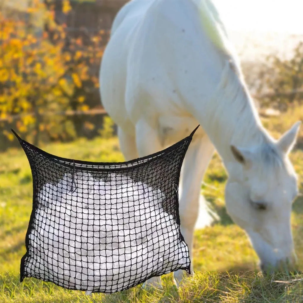Woven grid horse feeding bag in black or white colours with hanging straps for livestock feeding