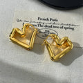 Unisex heart shaped ear clip earrings in gold and silver, retro minority design