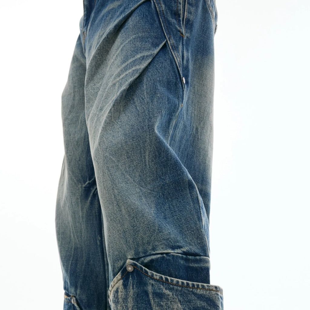 Men's retro washed burst pattern curved knife jeans in verdant blue colour showing loose fit design