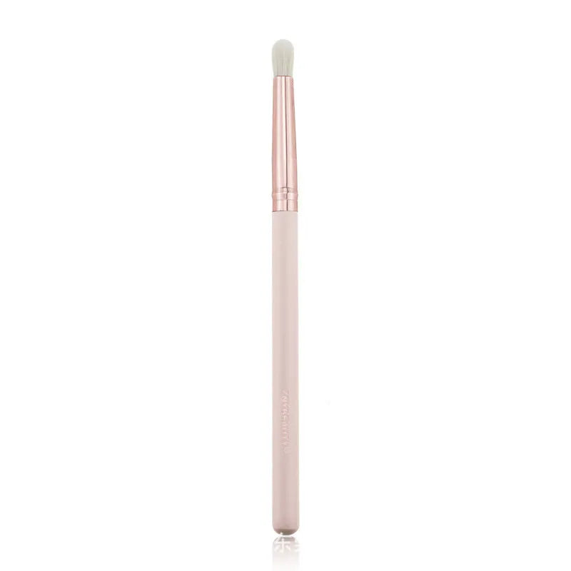 26 pink makeup brushes with wood handles arranged in a PU travel pouch.