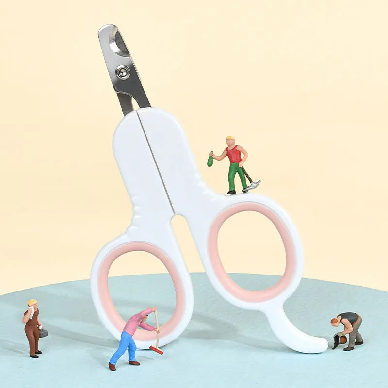 Professional pet nail clippers with curved safety tips and a grey non-slip rubber handle.