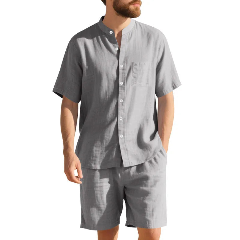 Men's light blue linen-blend summer suit with short sleeve shirt jacket and matching shorts on a hanger.