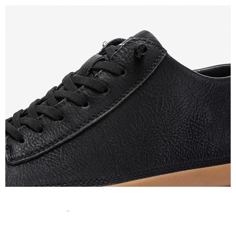 Men's black and white leather casual shoes with rubber soles and lace-up closure