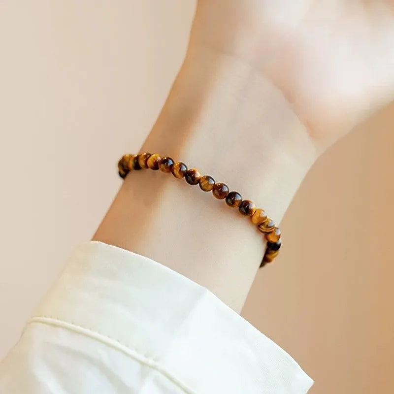 New Chinese style geometric bracelet made from brown and gold tigereye stone beads.