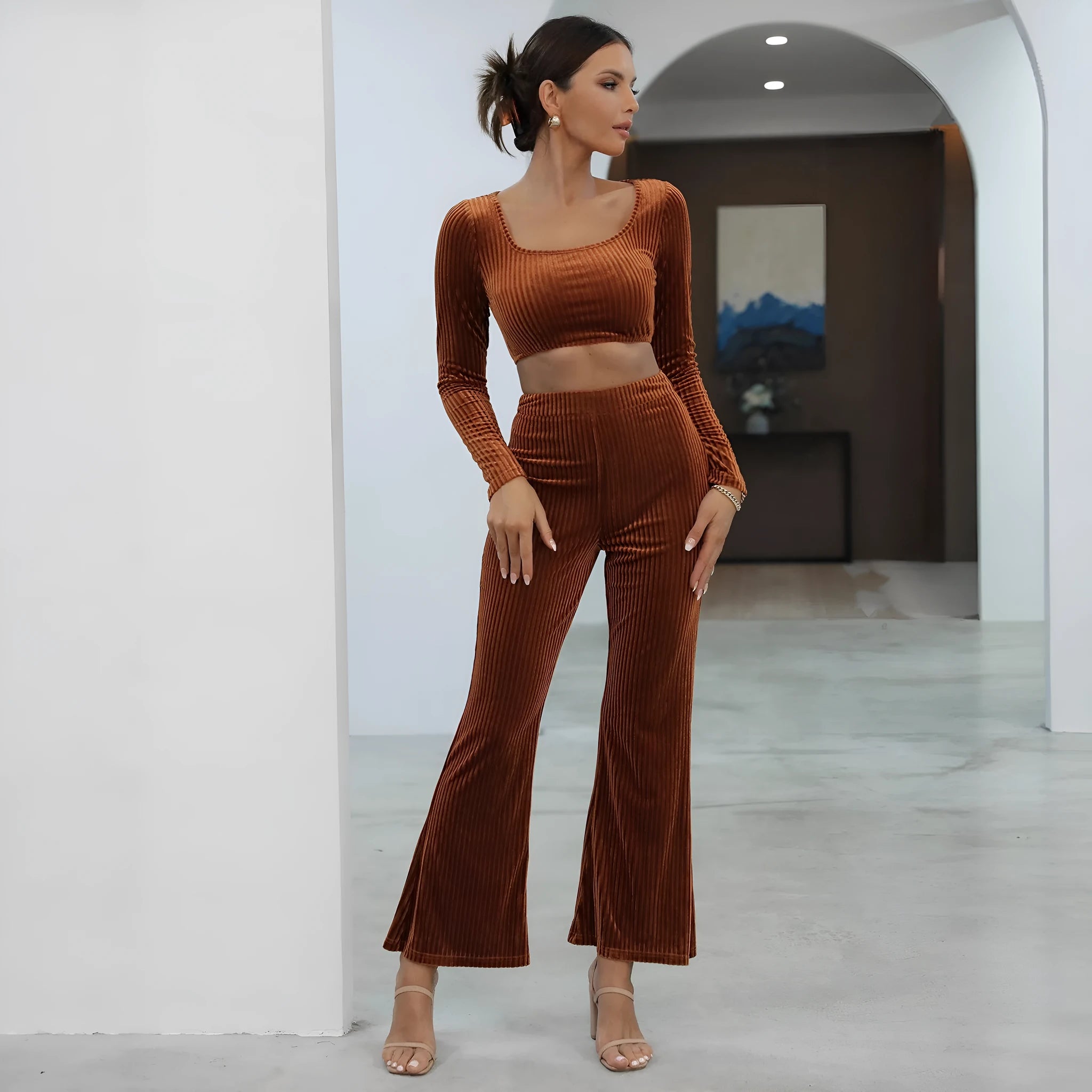 Caramel coloured long sleeve sweater and trousers set shown together