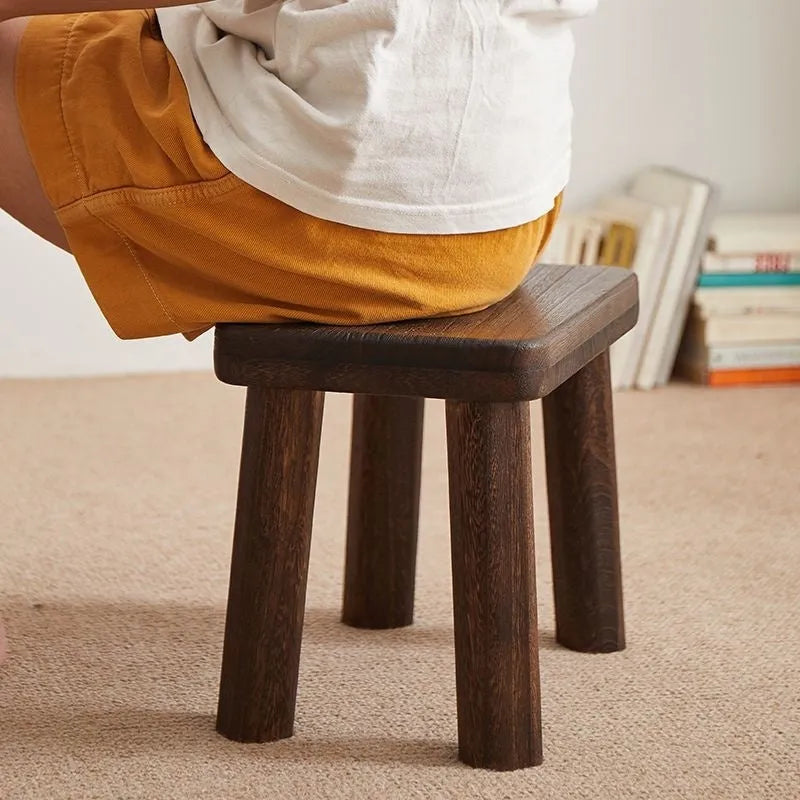 Solid wood shoe changing stool with distressed finish and bracket structure
