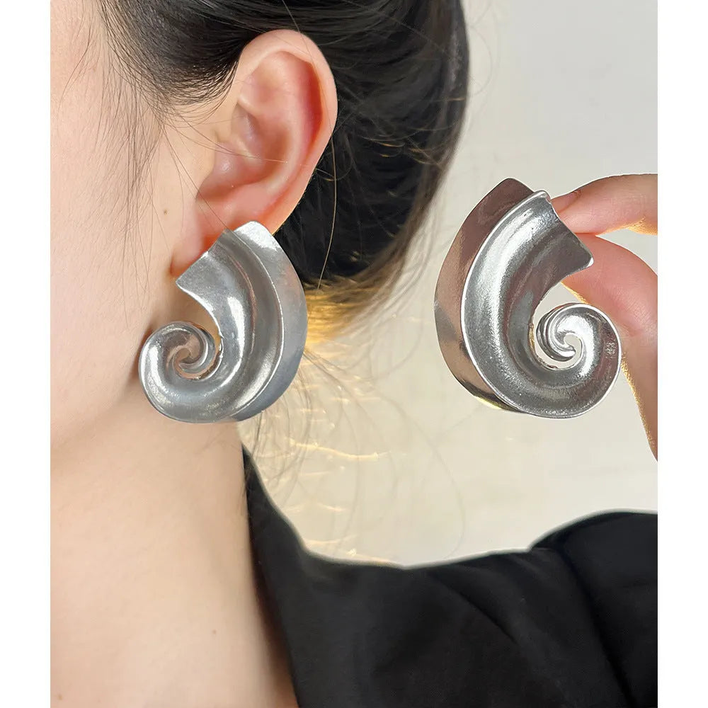 Geometric drop ear studs with retro design in gold or silver finish measuring 5cm length