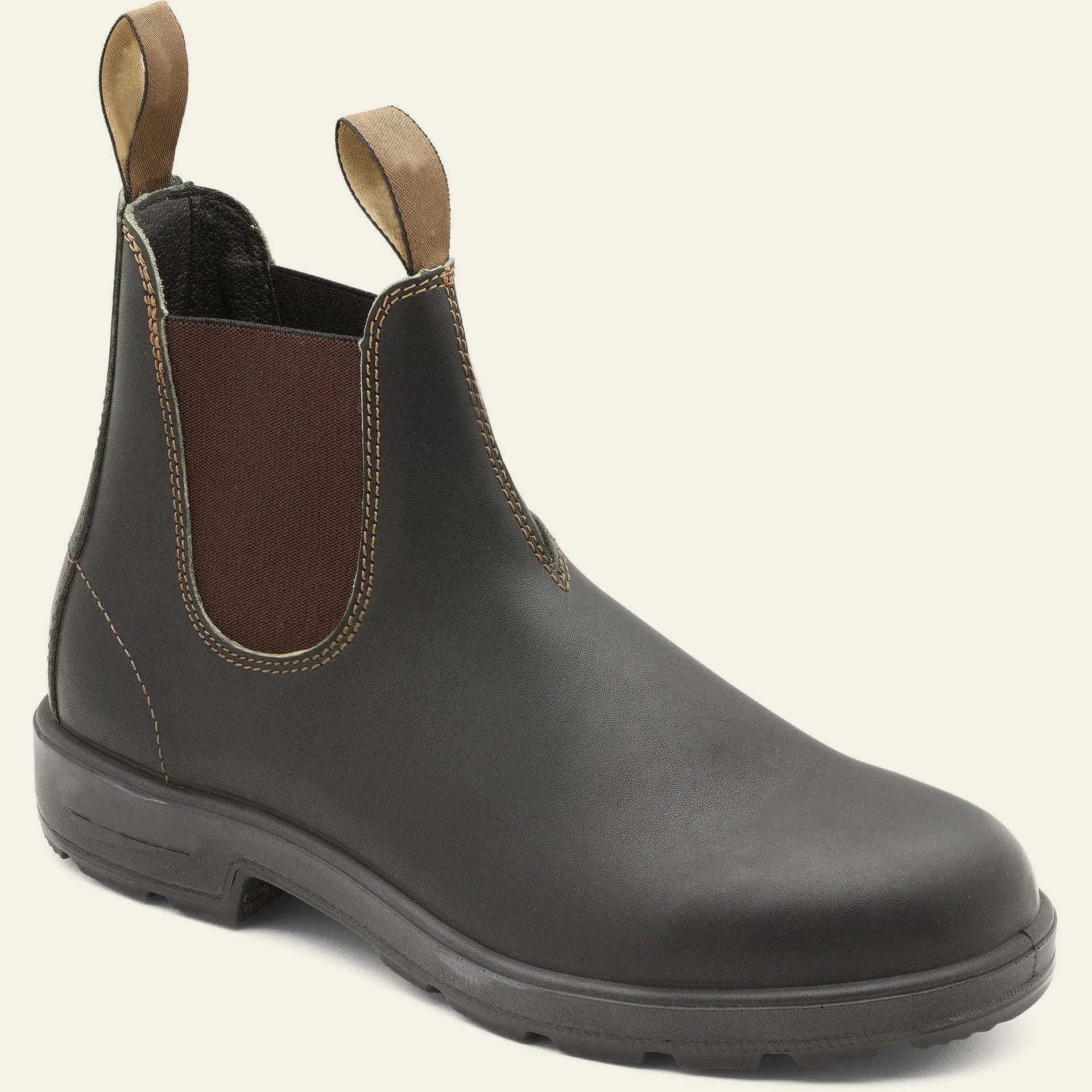Vintage brown unisex Chelsea boot with frosted PU upper and round toe on a wooden surface.