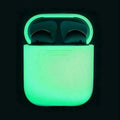 Luminous silicone protective case for Apple AirPods with flip-top design glowing in dark