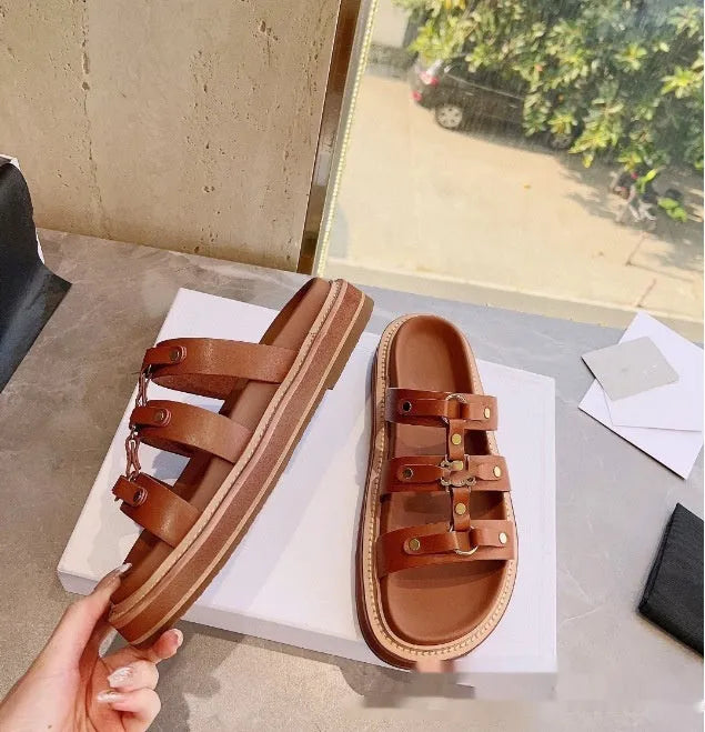 Women's white retro Roman-style sandal slippers with patent leather straps and sheepskin lining.