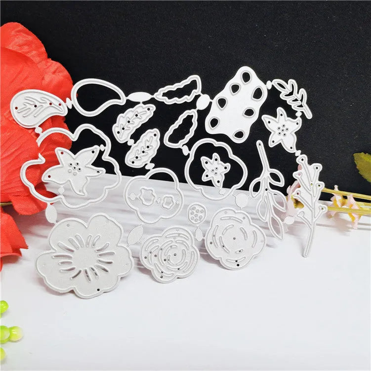 Silver carbon steel flower paper cutting knife mould measuring 14.3 by 9.9 cm