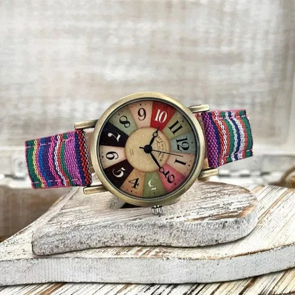 Ladies watch with multicolor rainbow pattern dial, antique bronze face, and PU leather strap