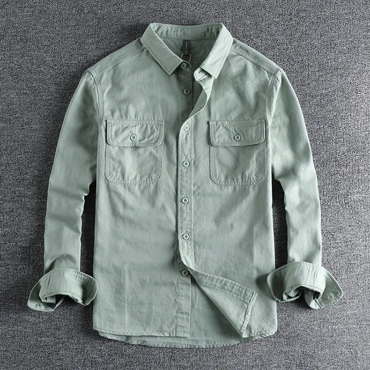 Man wearing loose fit long sleeve shirt overalls in cardigan style, made from polyester fabric