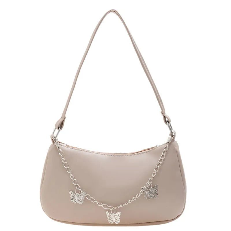 PU leather retro chain underarm bag in horizontal square shape showing crossbody strap and organised interior.