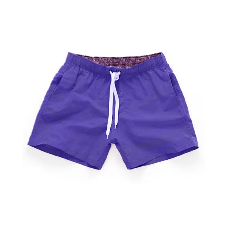Men's polyester beach shorts in multiple colours with straight leg design for surfing and casual wear