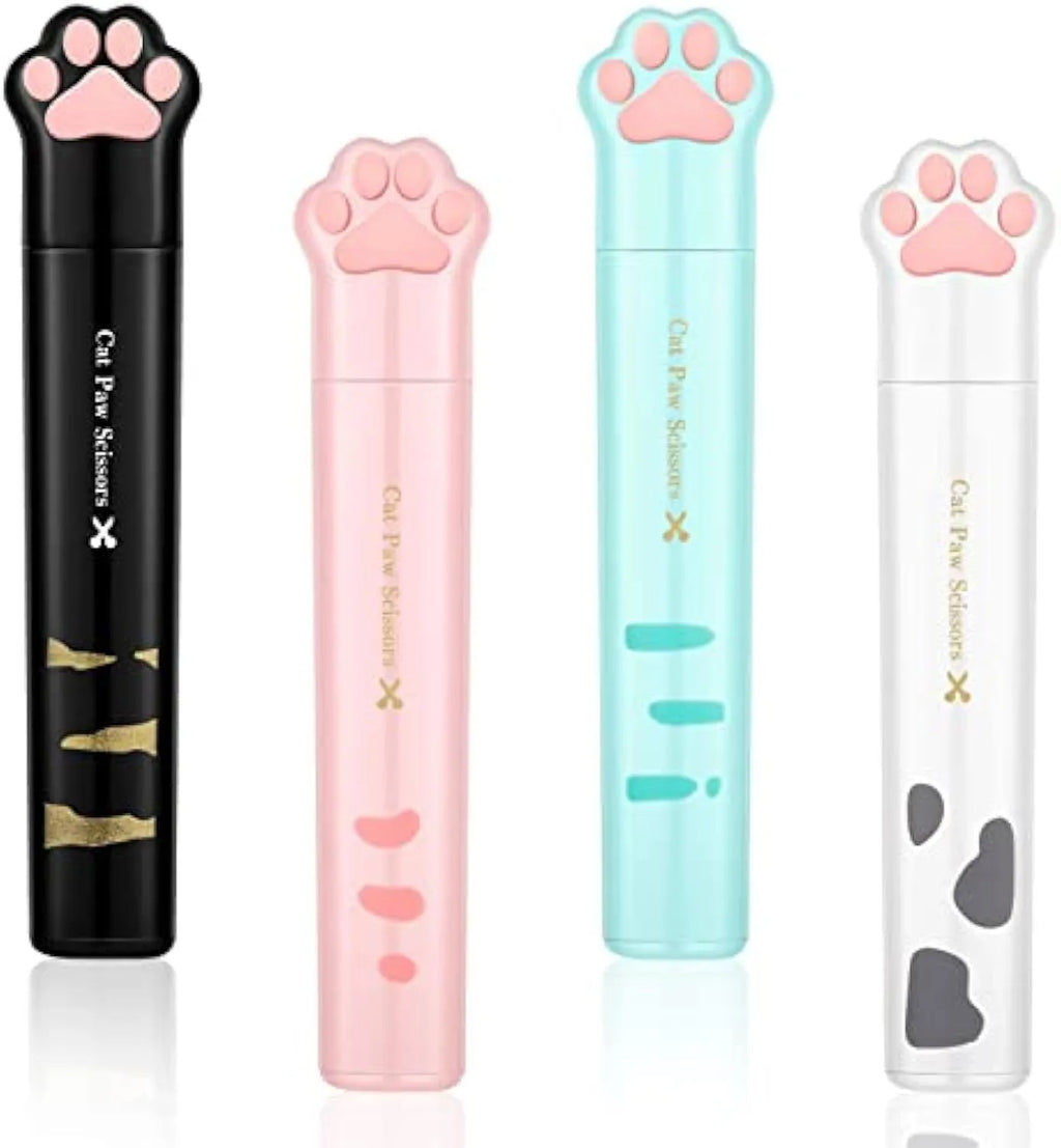 Closed pink cat paw mini folding safety scissors showing the cartoon handle design.