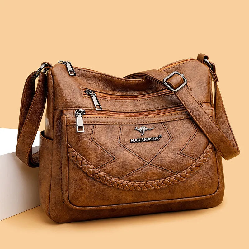 Soft PU leather shoulder bag in horizontal square shape with large capacity and zippered compartments
