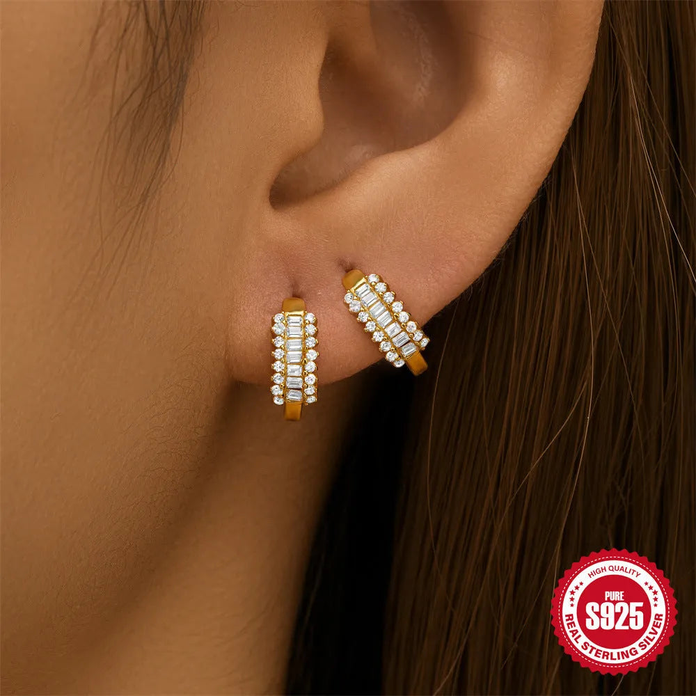 Sterling silver geometric stud earrings with small round diamond accents in gold or silver electroplated finish
