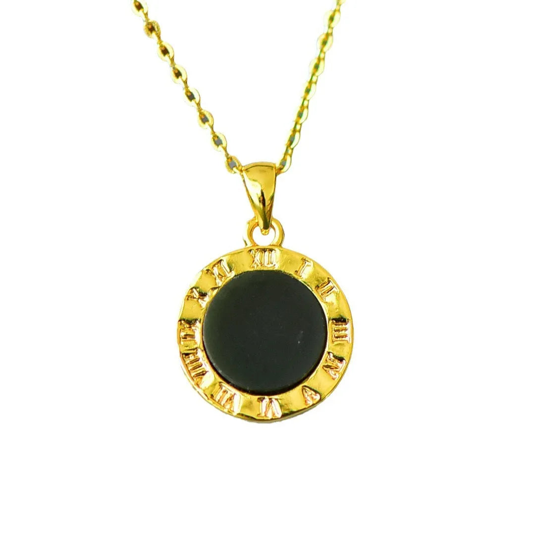 Flat geometric Hetian jade pendant with copper inlay on a necklace chain.