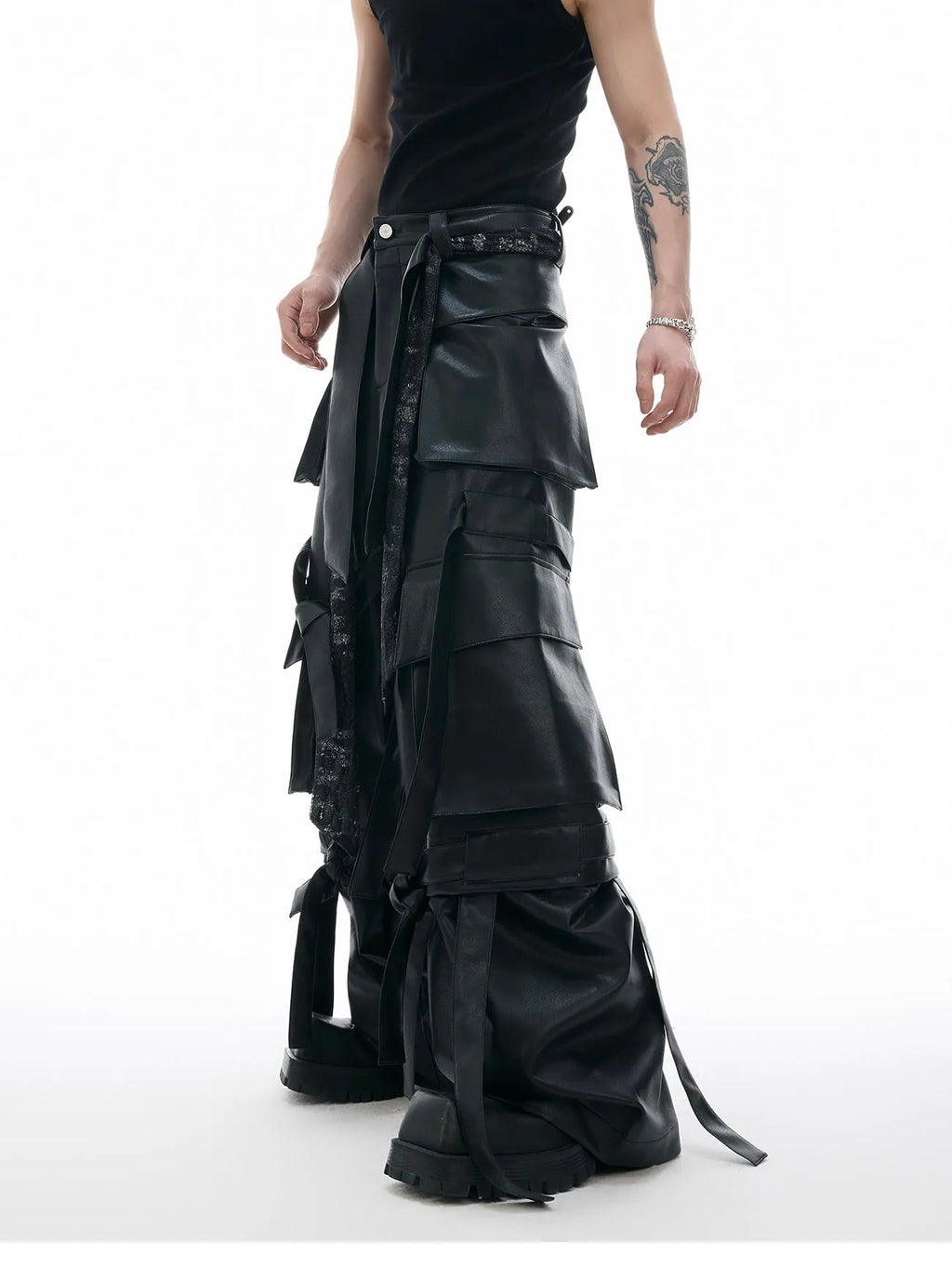 Black loose-fit retro leather pants with multiple pockets and quilted stitching detail