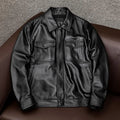 Men's plus size black lapel leather jacket with side pockets, shown on a hanger.