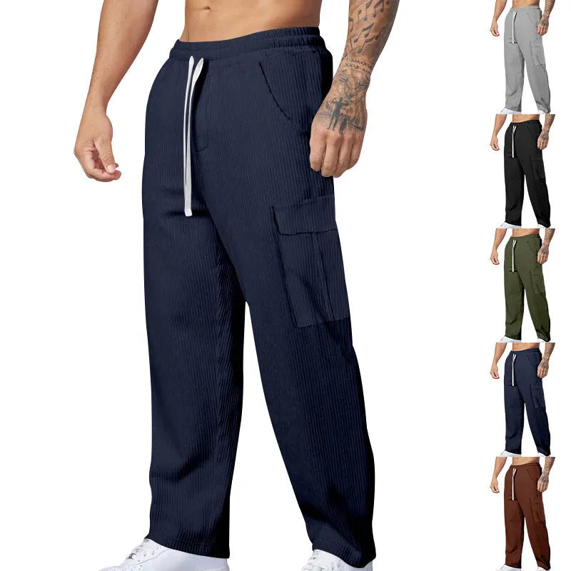 Men's straight-leg corduroy cargo trousers in navy blue with a drawstring waist.