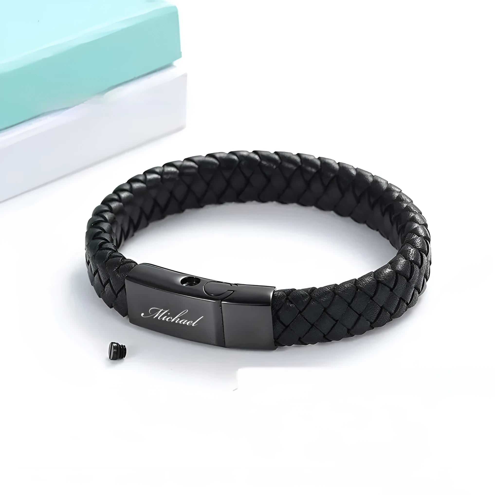 Black stainless steel and leather cinerary bracelet with engraved text, presented in a gift box.