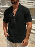 Men's solid colour stand collar short-sleeved shirt with slit detail in light blue.