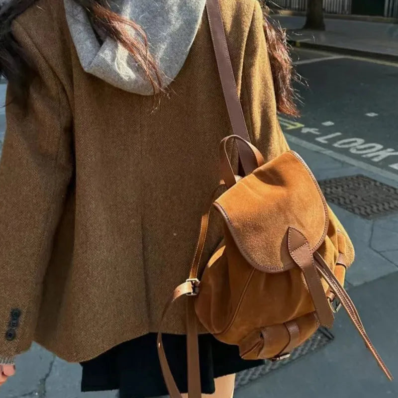 Women's light brown velvet frosted backpack with flap closure and double shoulder straps