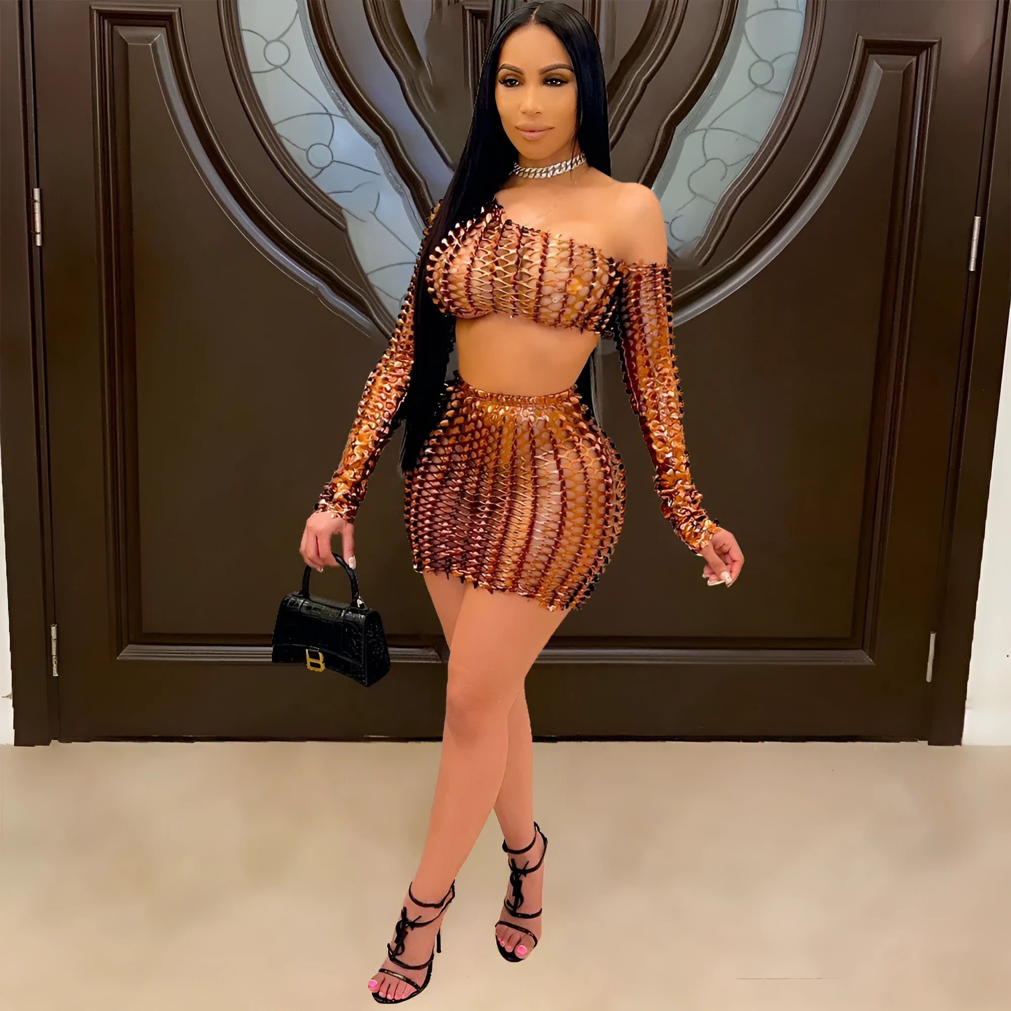 Women's black two-piece dress set with net hole hollow-out design on sleeveless top and short skirt
