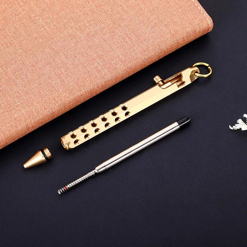Brass hexagonal roller pen with 0.5mm tip showing six flat sides and retro design