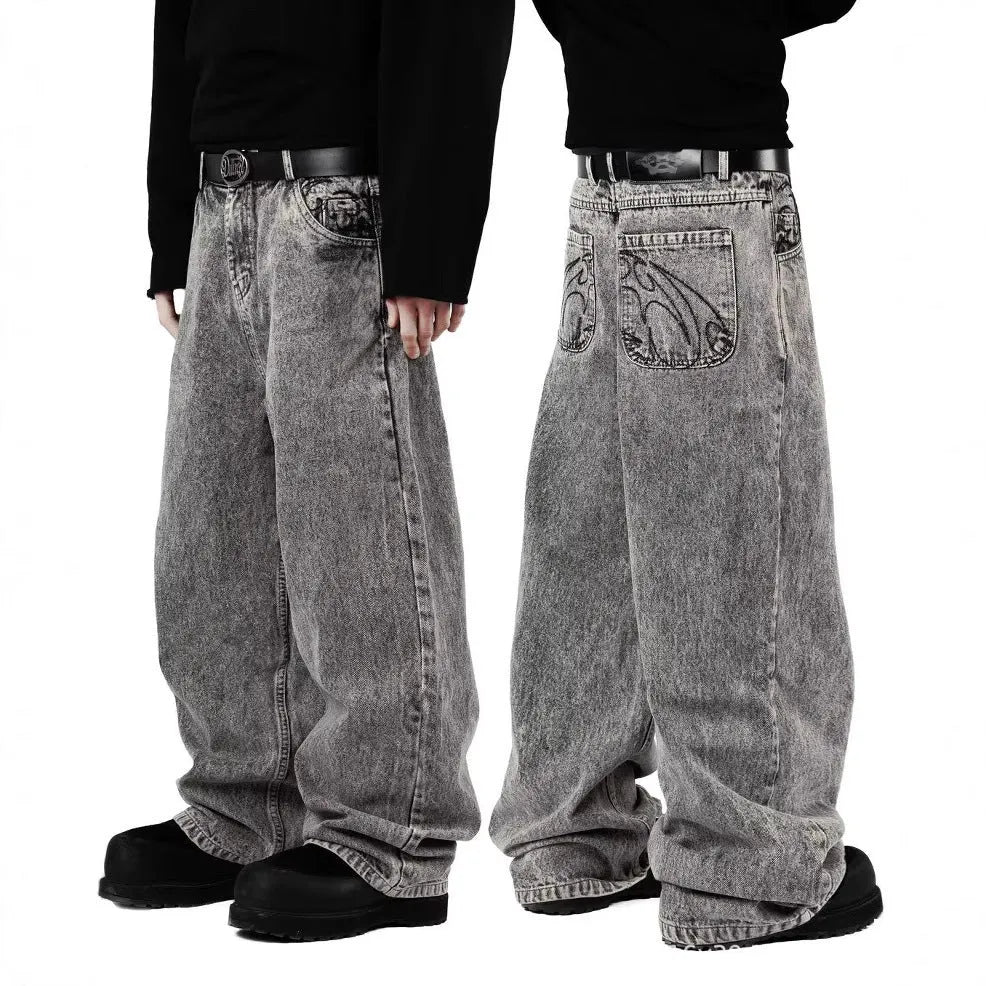 Grey loose straight-leg denim trousers for men and women on hanger