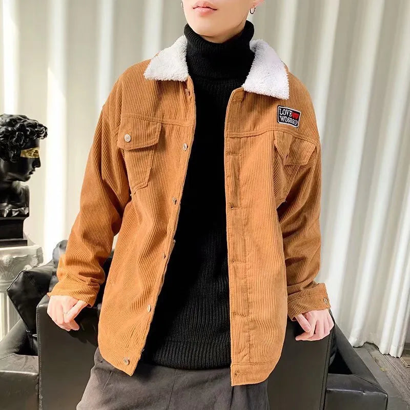 Men's loose fit corduroy workwear jacket in khaki colour with patch pockets.