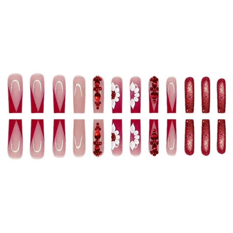 Sweet flower pattern fake nails with prismatic red diamond accents, jelly glue and nail file