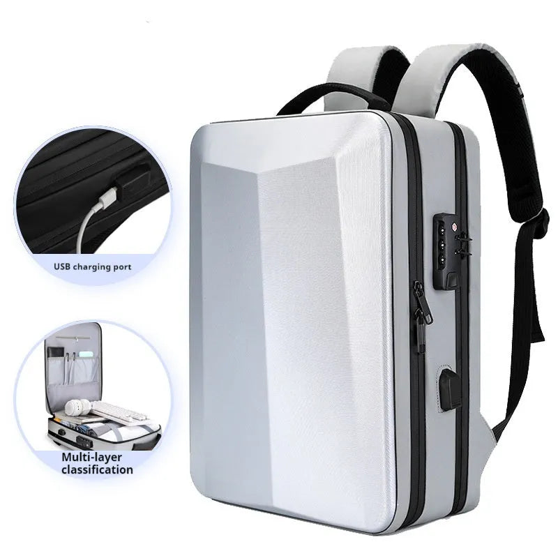 Black and silver white waterproof ABS PC business backpack with curved straps, shown with a laptop.