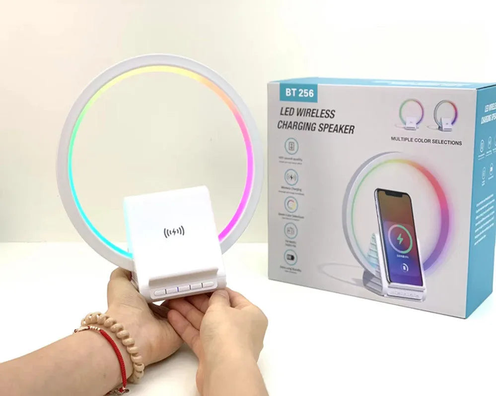 White circular smart Bluetooth speaker with wireless charging pad and ambient light, 225mm diameter