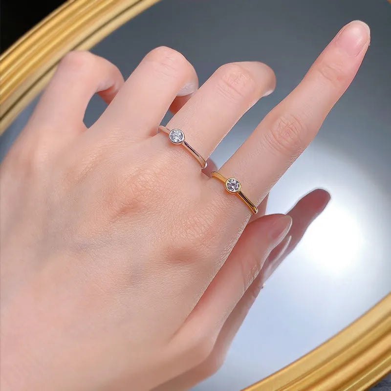Minimalist silver crown ring with line detailing, shown in gold or platinum electroplated finish.