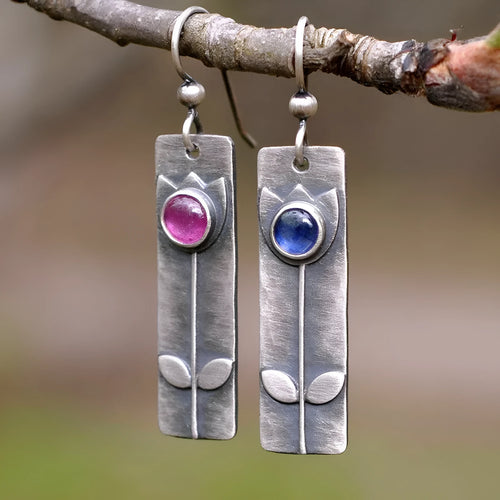 Antique finish red sapphire earrings with geometric ellipse shape in retro style