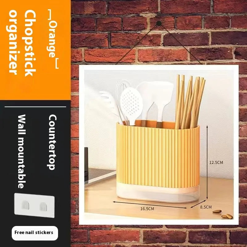 Modern plastic wall-mounted chopsticks and spoon holder in beige, dark green, or orange.