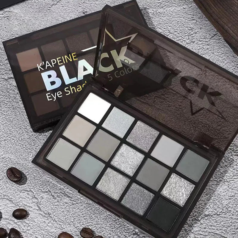 15-colour eyeshadow palette with matte and shimmer pans including cos grey and black shades