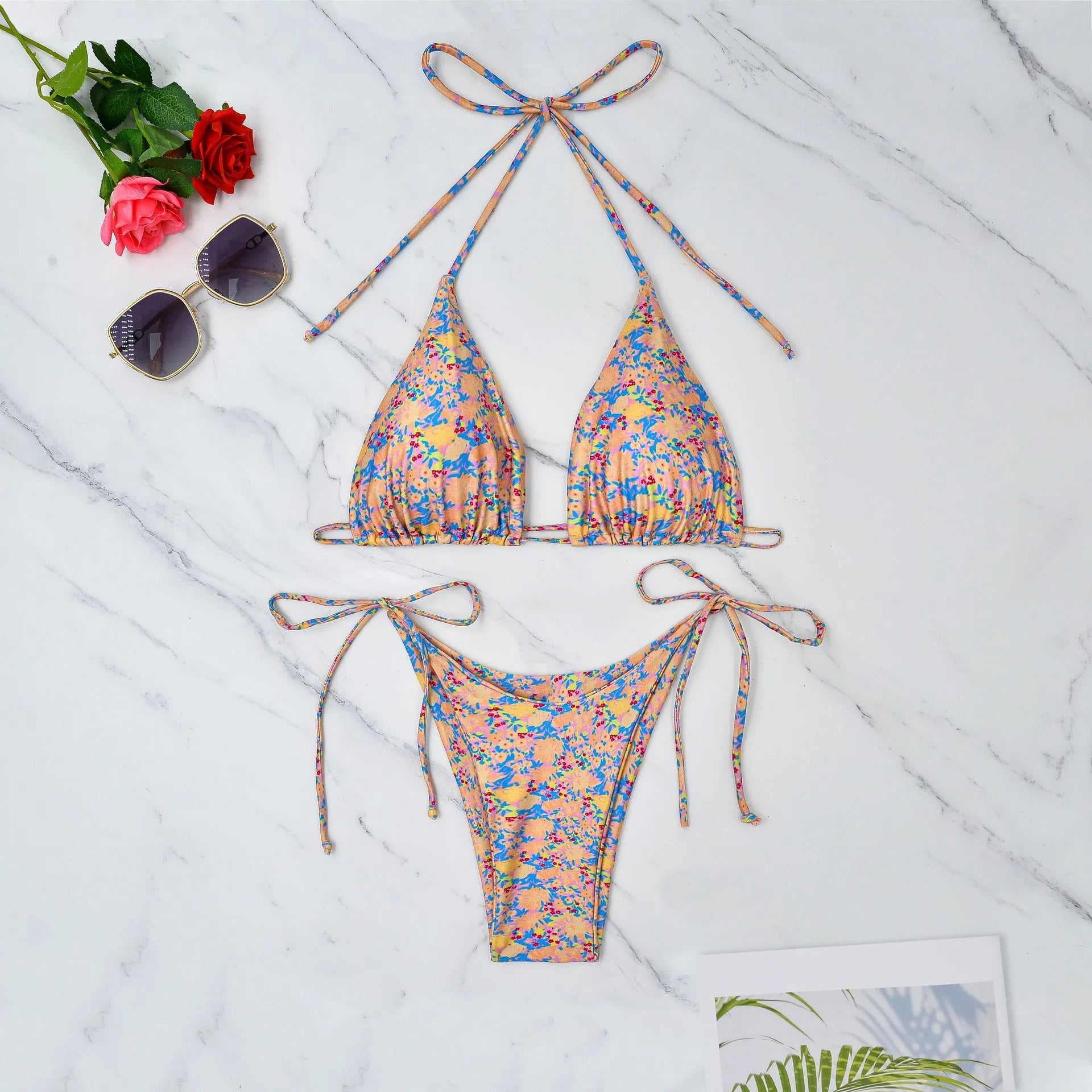 Lace-up bikini swimsuit with backless design and split briefs in polyester fabric