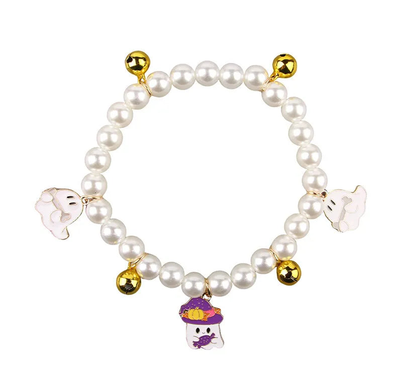 Halloween cat collar with simulated pearl necklace decoration showing pumpkin print patterns