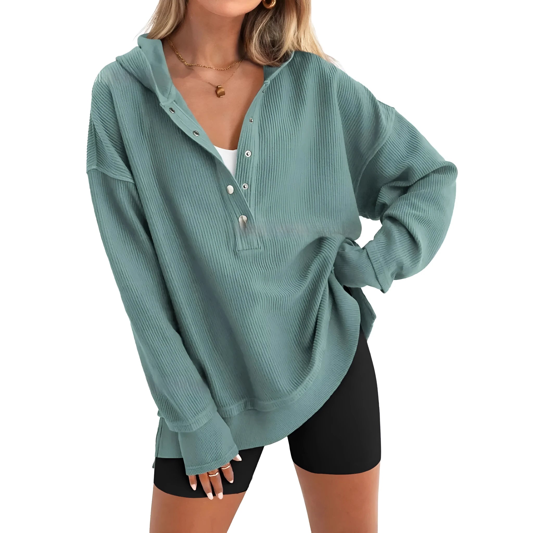 Women's loose peacock green raglan sleeve pullover sweater on a hanger.