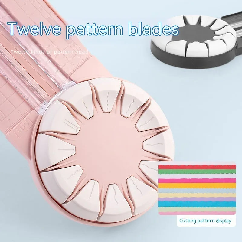 Pink plastic 12-in-1 multifunctional paper cutter with dotted guide lines on a white surface.