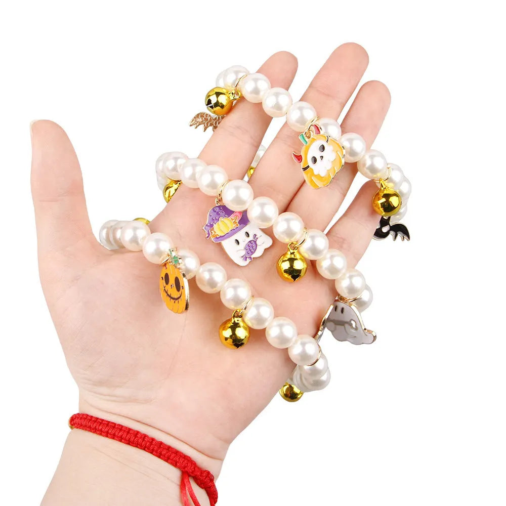 Halloween cat collar with simulated pearl necklace decoration showing pumpkin print patterns