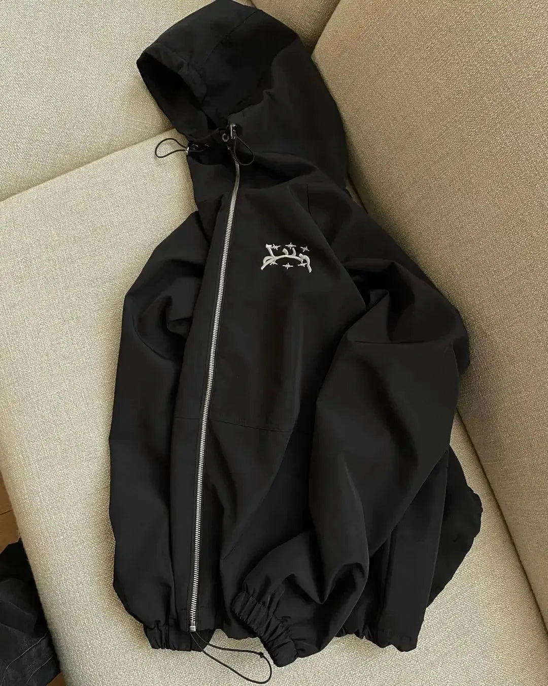 Men's grey hooded sunscreen jacket in British loose style shown on model