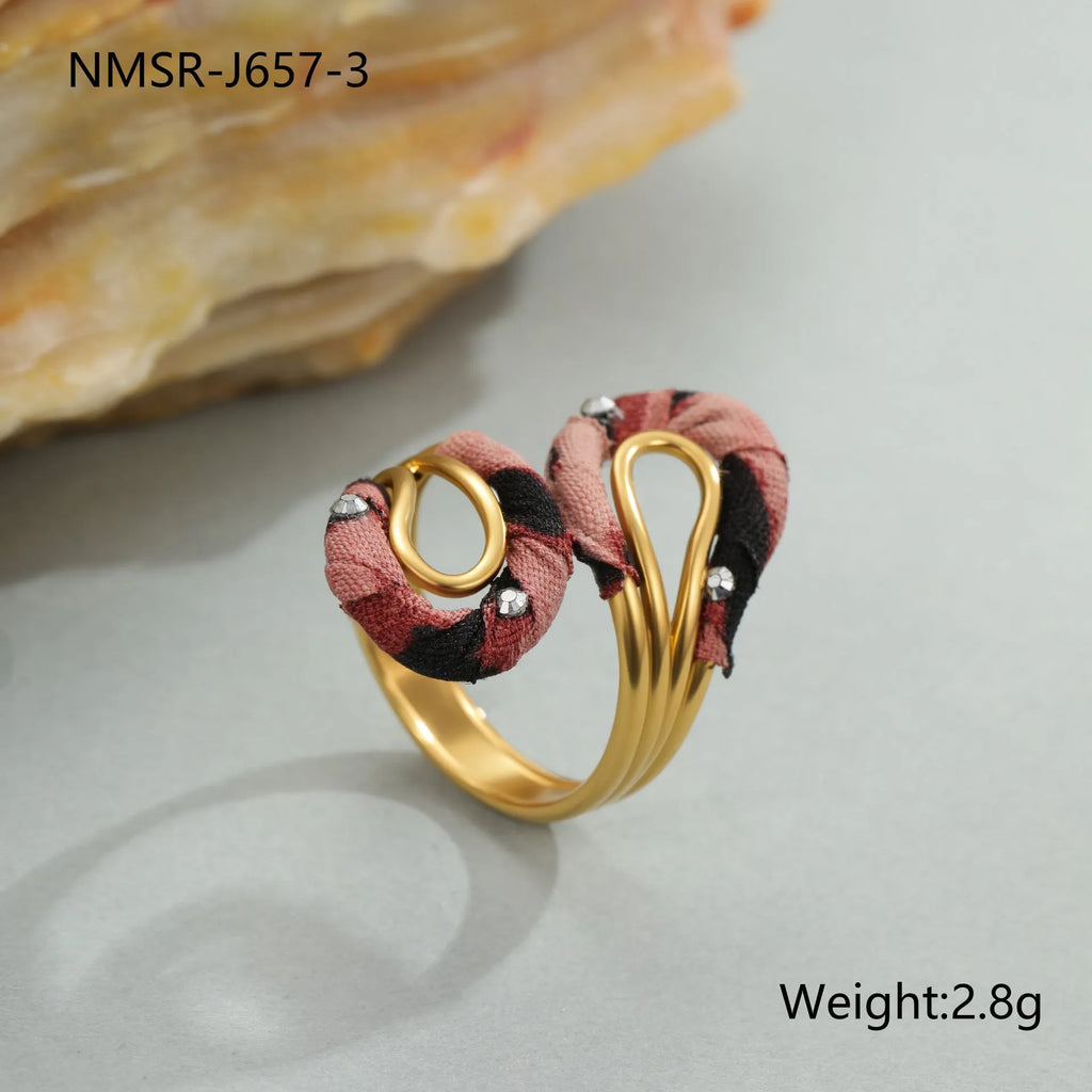 Geometric stainless steel open mouth ring with leopard print patterns in heart and star shapes
