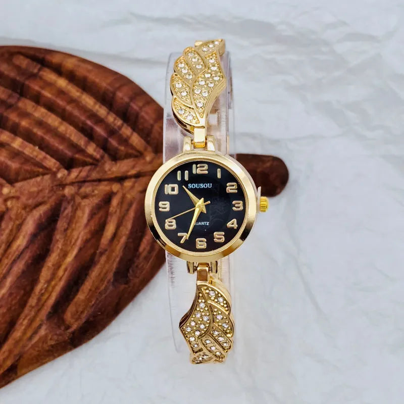 Stainless steel ladies watch with round dial on metal strap with Vachette clasp