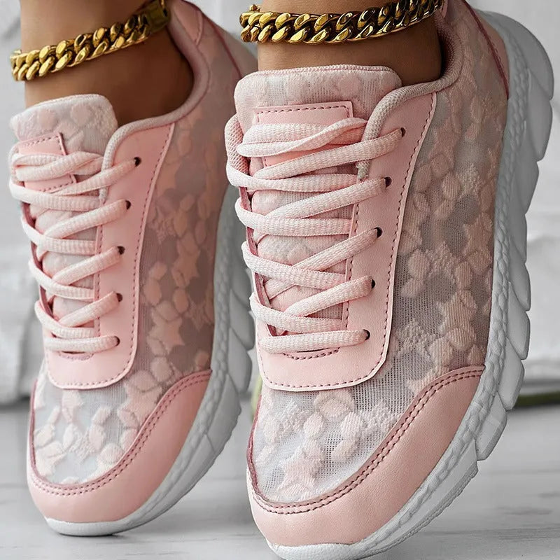 Women's casual canvas running shoes in white, black, blue or pink with flat heel and round toe design